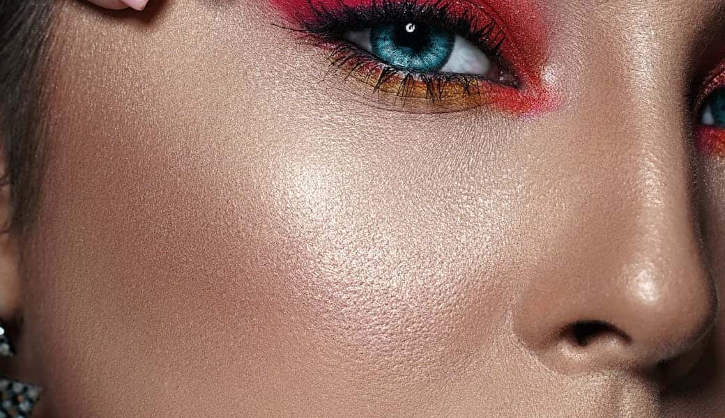 close up photo of woman with pink eyeshadow