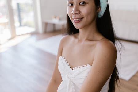 portrait of a smiling woman without makeup