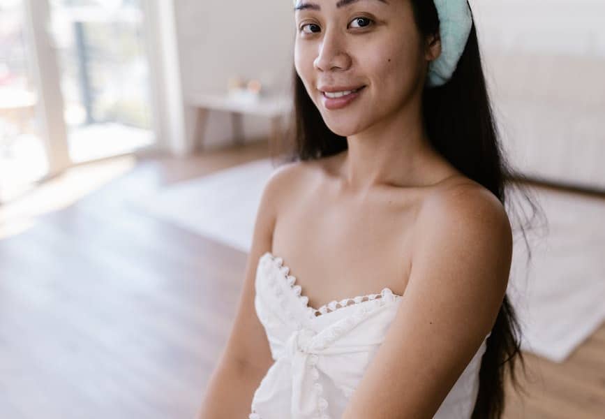 portrait of a smiling woman without makeup