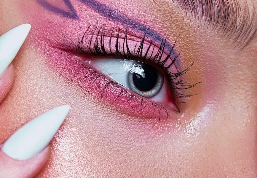 close up of woman wearing creative makeup