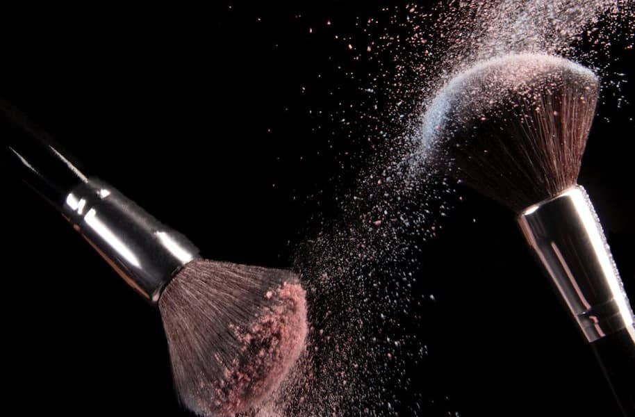 cosmetics makeup brushes and powder dust explosion